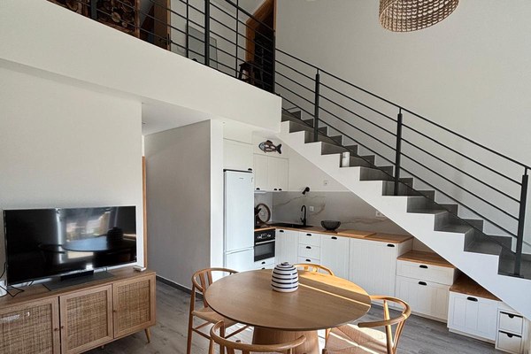Loft - double-height living room with mezzanine and staircase, Odeceixe